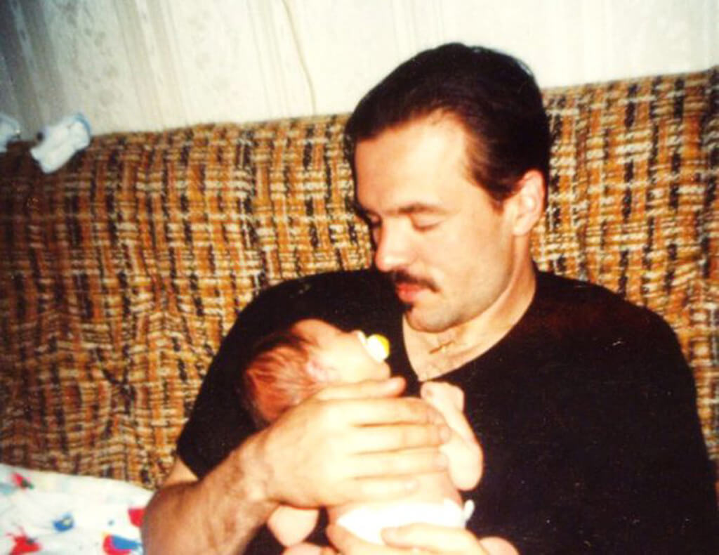 Pavel Sandrak Holding Baby Richard